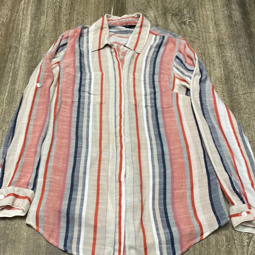 Two pockets in the front button up 100% Rayon shirt
